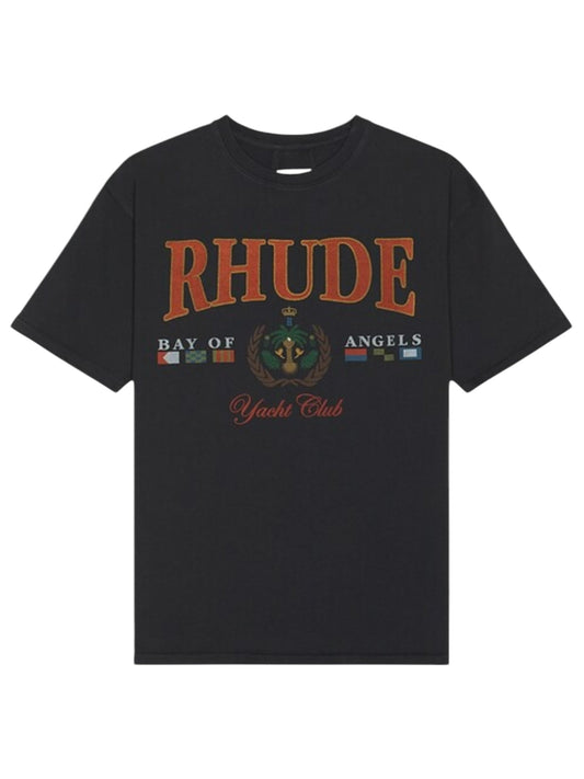 The Rhude Bay Of Angels Yacht Tee in black is a 100% cotton graphic T-shirt from RHUDE, featuring "RHUDE Bay of Angels Yacht Club" text and bold flag graphics on the front.