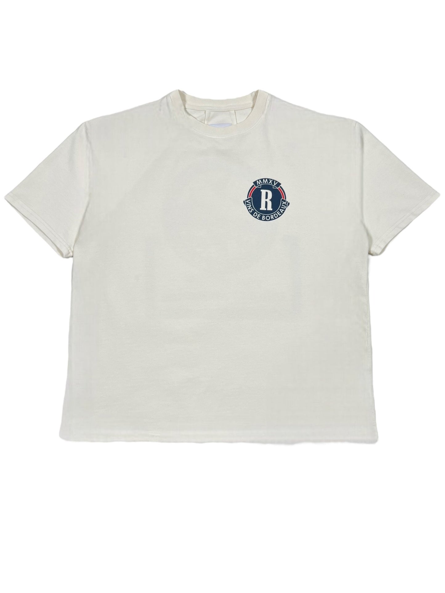 The Rhude Bordeaux Wine Tee Vtg White from RHUDE is a 100% cotton T-shirt in white, featuring a small circular logo with an "R" on the upper left side.