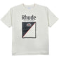 The RHUDE Collins Fumar Tee in Vintage White/Black/Red is crafted from 100% cotton, featuring "Rhude Menthol Blend" text and a crest with a diagonal line graphic on the front.