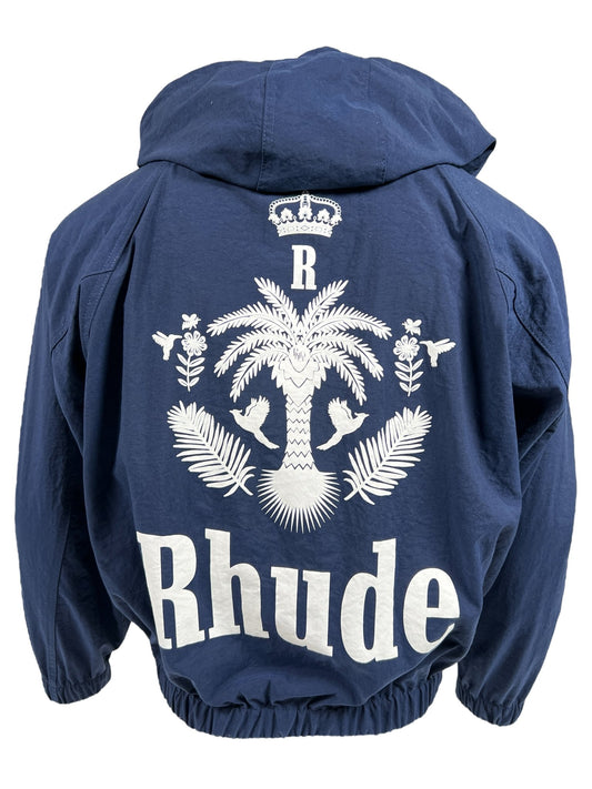 RHUDE PALM TRACK JACKET NAVY hoodie jacket with a white "RHUDE Crest" logo and graphic design featuring a palm tree and crown on the back, complemented by a two-way zipper closure.