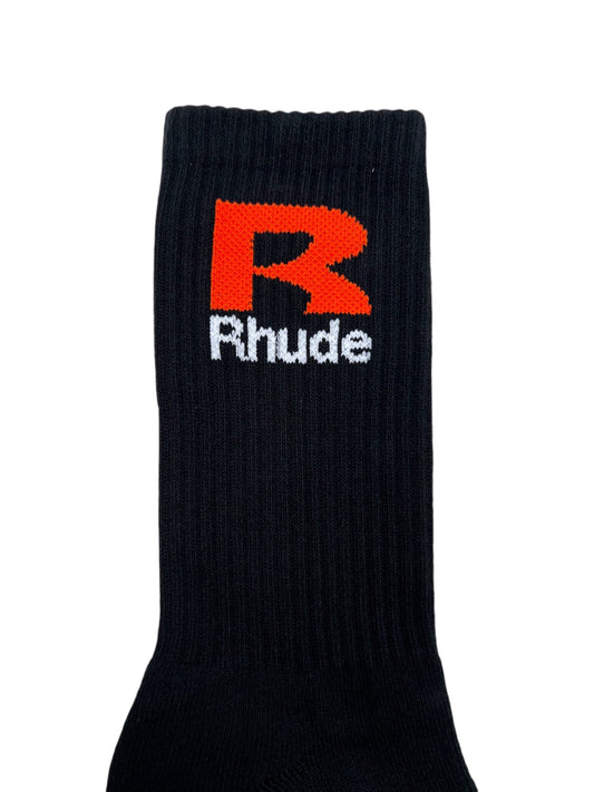 RHUDE R SOCK BLACK/ORANGE featuring a prominent orange "R" and the word "Rhude" in white text below it, crafted from soft, breathable cotton.