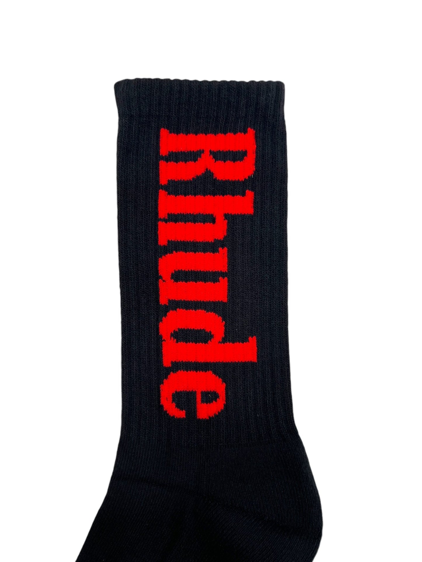 The RHUDE VERTICAL LOGO SOCK BLACK/RED features the word "Rhude" in bold red letters on a black sock.