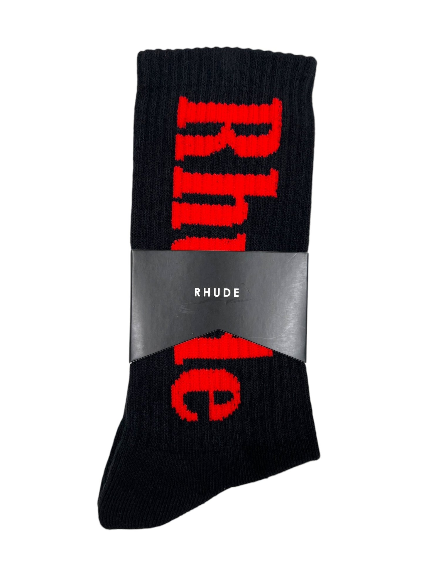 The RHUDE VERTICAL LOGO SOCK BLACK/RED features a black pair of socks with the brand name "RHude" written in large red letters vertically and is packaged with a black band that also displays the brand name "RHude.