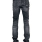 Model wears RTA Olivier Stacked Graphite Fade Cross Black jeans, viewed from the back, highlighting visible pockets and subtle distressing details in soft cotton.
