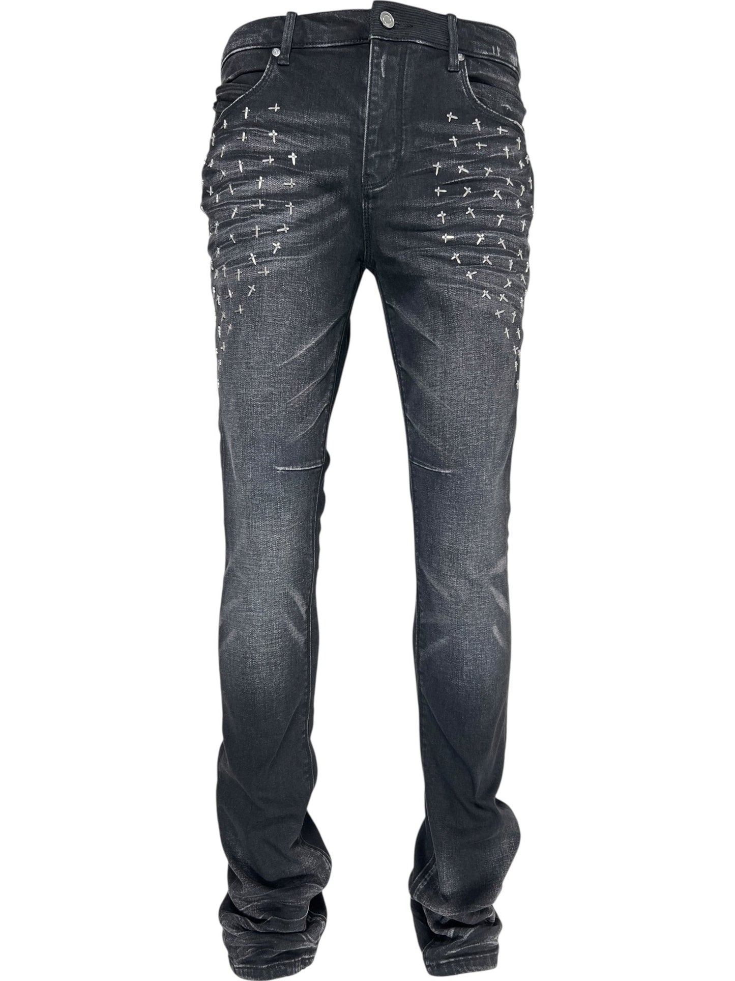 The RTA Olivier Stacked Graphite Fade Cross Black jeans feature white X stitches on the front thighs and subtle knee and hem wrinkling, capturing RTA’s signature stacked style in a black cotton denim graphite fade wash.