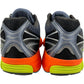 Rear view of Saucony Progrid Guide 7 (S70936-13) running shoes in grey/multi, featuring mesh uppers, black and gray details, orange midsoles, green outsoles, and ProGrid Technology for enhanced comfort.