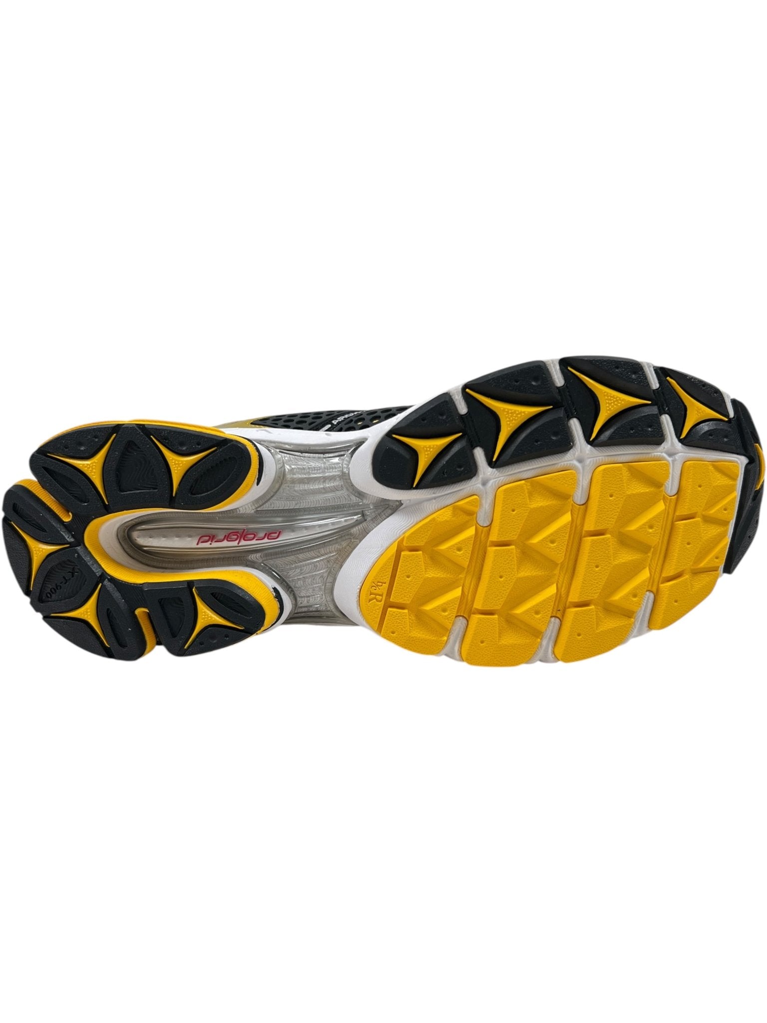 The image shows the yellow, black, and white rubber outsole with a textured tread pattern of the SAUCONY Progrid Triumph 4 (S70704-16) Lemon Chrome running shoe.