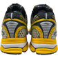 The SAUCONY Progrid Triumph 4 (S70704-16) Lemon Chrome athletic shoes in yellow, black, and silver feature mesh uppers with Arch-lock technology and "loyal to the" printed on the inner lining.