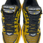 A pair of SAUCONY Progrid Triumph 4 (S70704-16) Lemon Chrome running shoes in yellow and black, shown from above to highlight the laces and breathable mesh upper.