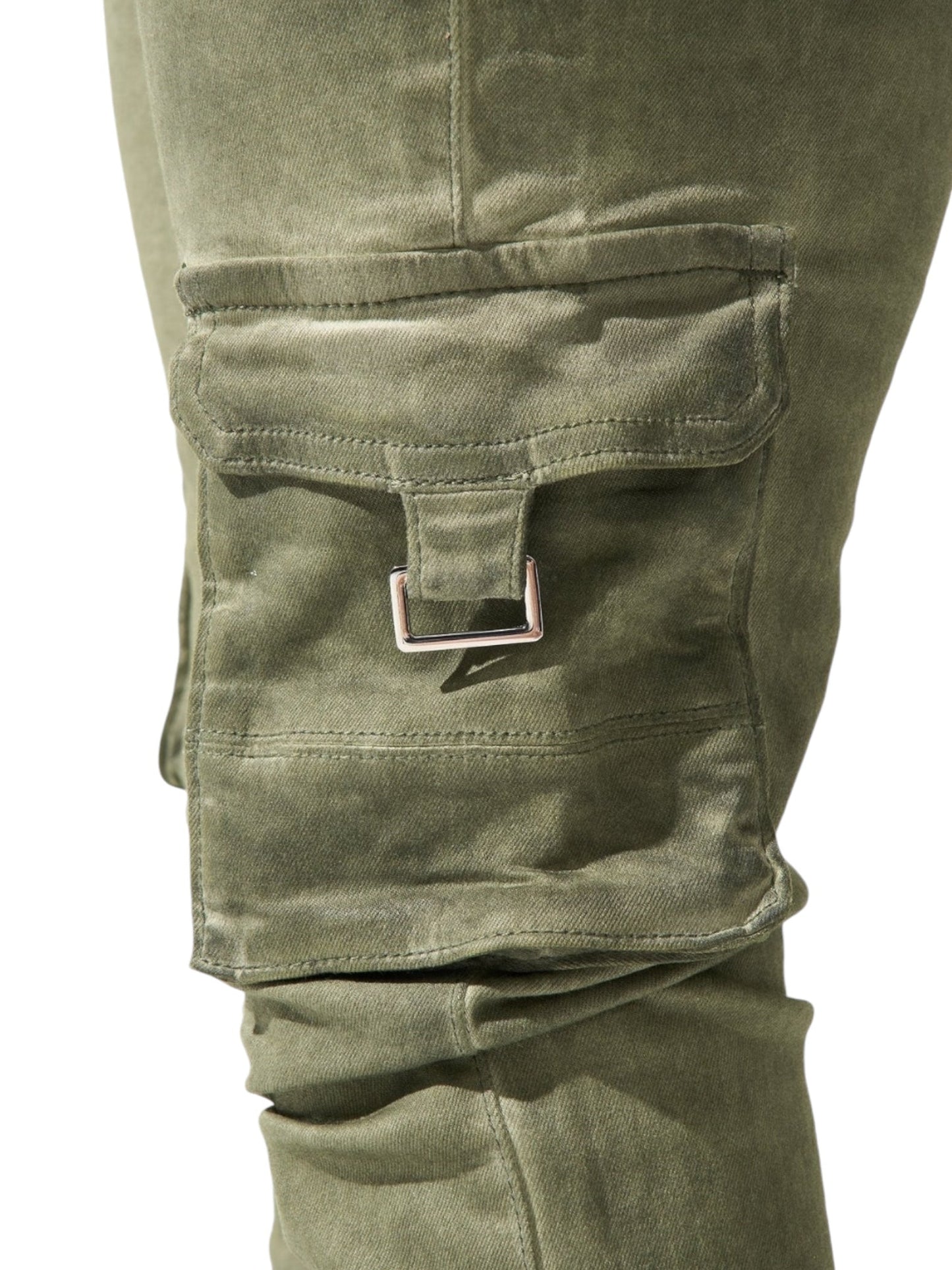 Close-up of an olive green SERENEDE Serenede Oil Cargo pocket with a metal buckle on a pair of stacked jeans.