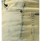 Close-up of the front pocket and hip area of the SERENEDE SOL JEANS RISE, distressed light blue slim fit men's jeans by SERENEDE, showcasing fabric texture and stitching details made from stretch cotton for added comfort.