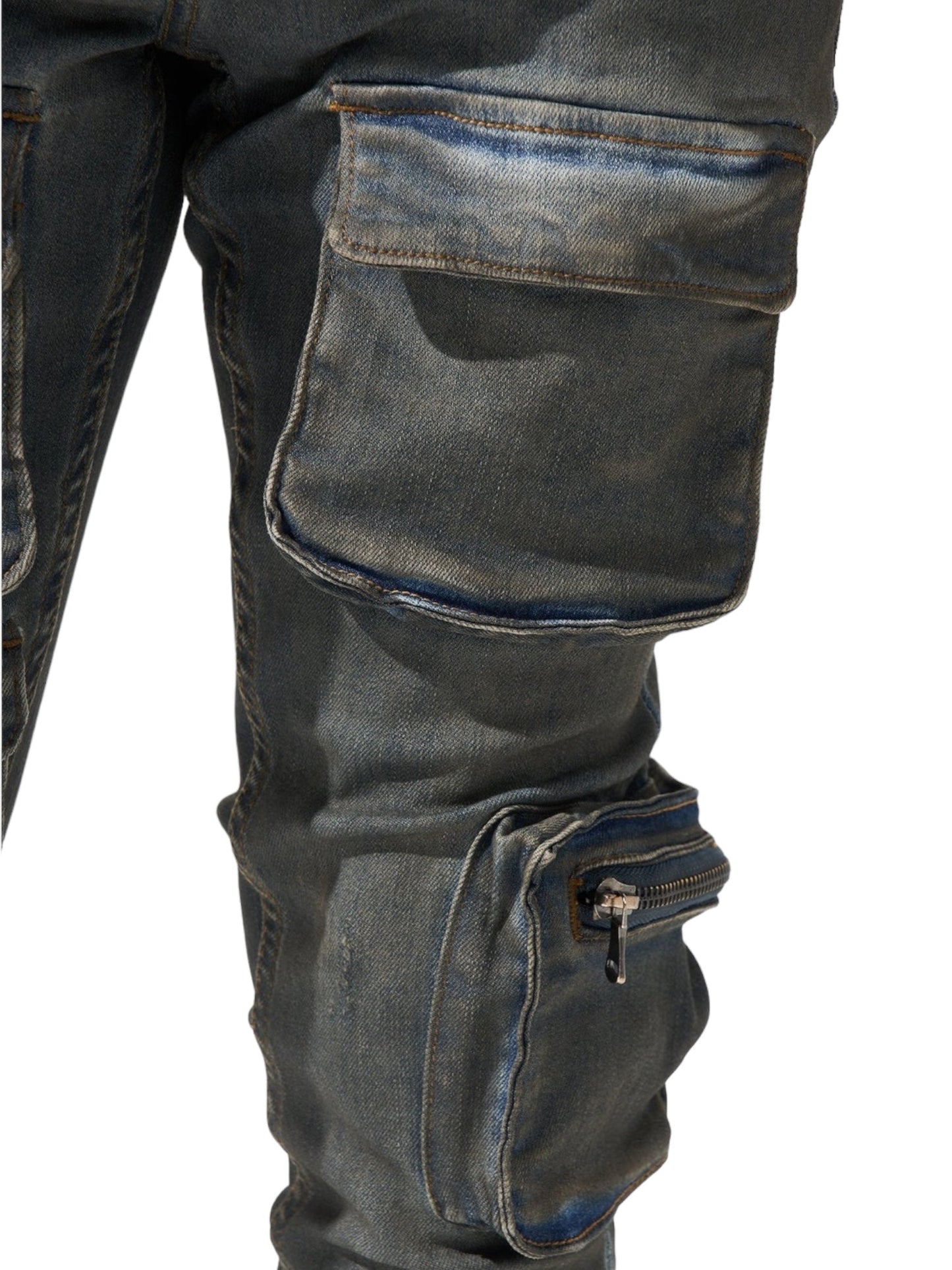 Close-up view of a person's leg wearing SERENEDE WAVE CARGO JEANS by SERENEDE in atlantic dark blue, featuring multiple cargo pockets including a zippered pocket.