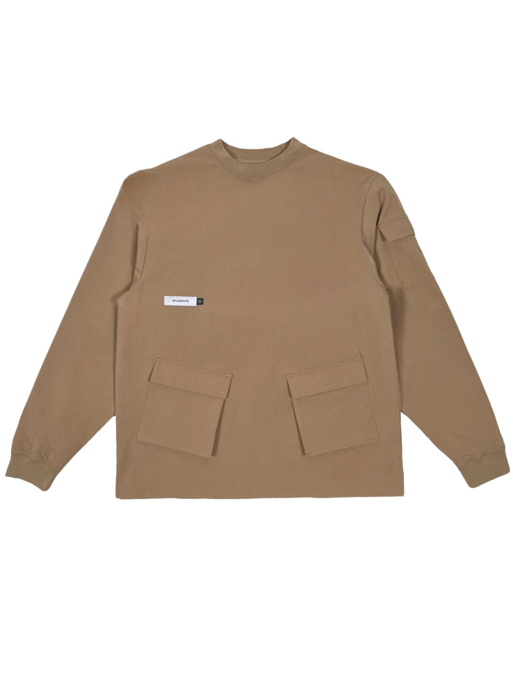 The Students Niall nylon popover jacket in tan, designed by STUDENTS, features long sleeves with stretch nylon, two large 3D pockets, and is accented by a small rectangular label on the chest.