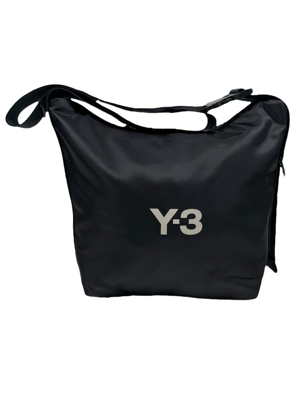 A sleek, black ADIDAS x Y-3 JD2905 -3 Sacoche made from 100% polyester with two handles is elegantly displayed against a white background, highlighting its premium design reminiscent of the iconic Y-3 messenger bag.