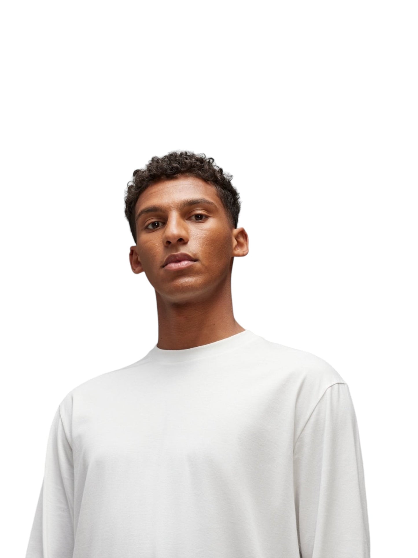 An individual wearing the ADIDAS x Y-3 JM3234 U GFX LS Tee Cwhite, a long sleeve tee crafted from soft cotton fabric, stands against a white background.