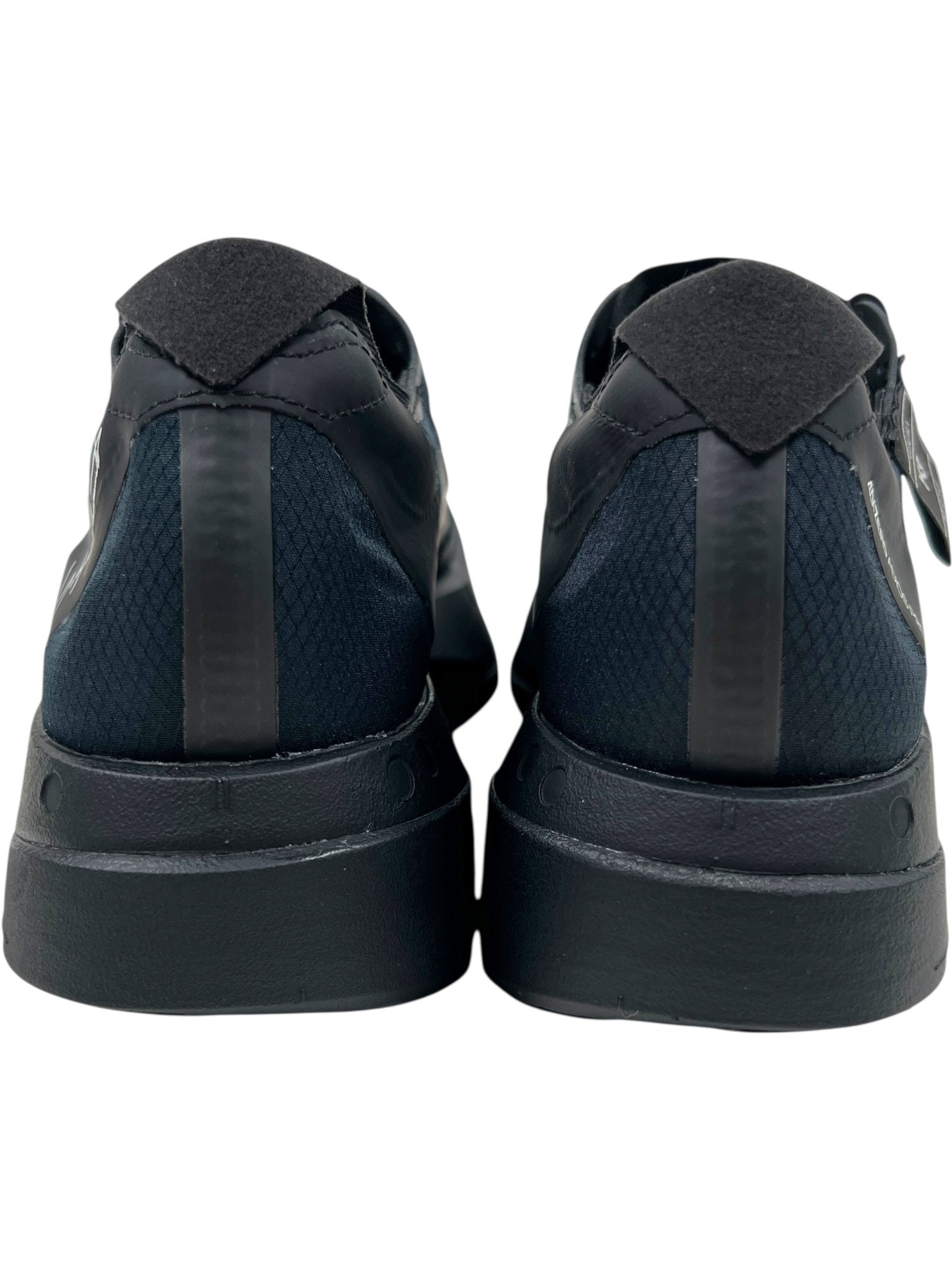 Rear view of the ADIDAS x Y-3 Y-3 JR6655 ADIOS PRO 4 M in Black/Black-CWhite, featuring textured fabric, heel pull tabs, and advanced Lightstrike Pro cushioning.