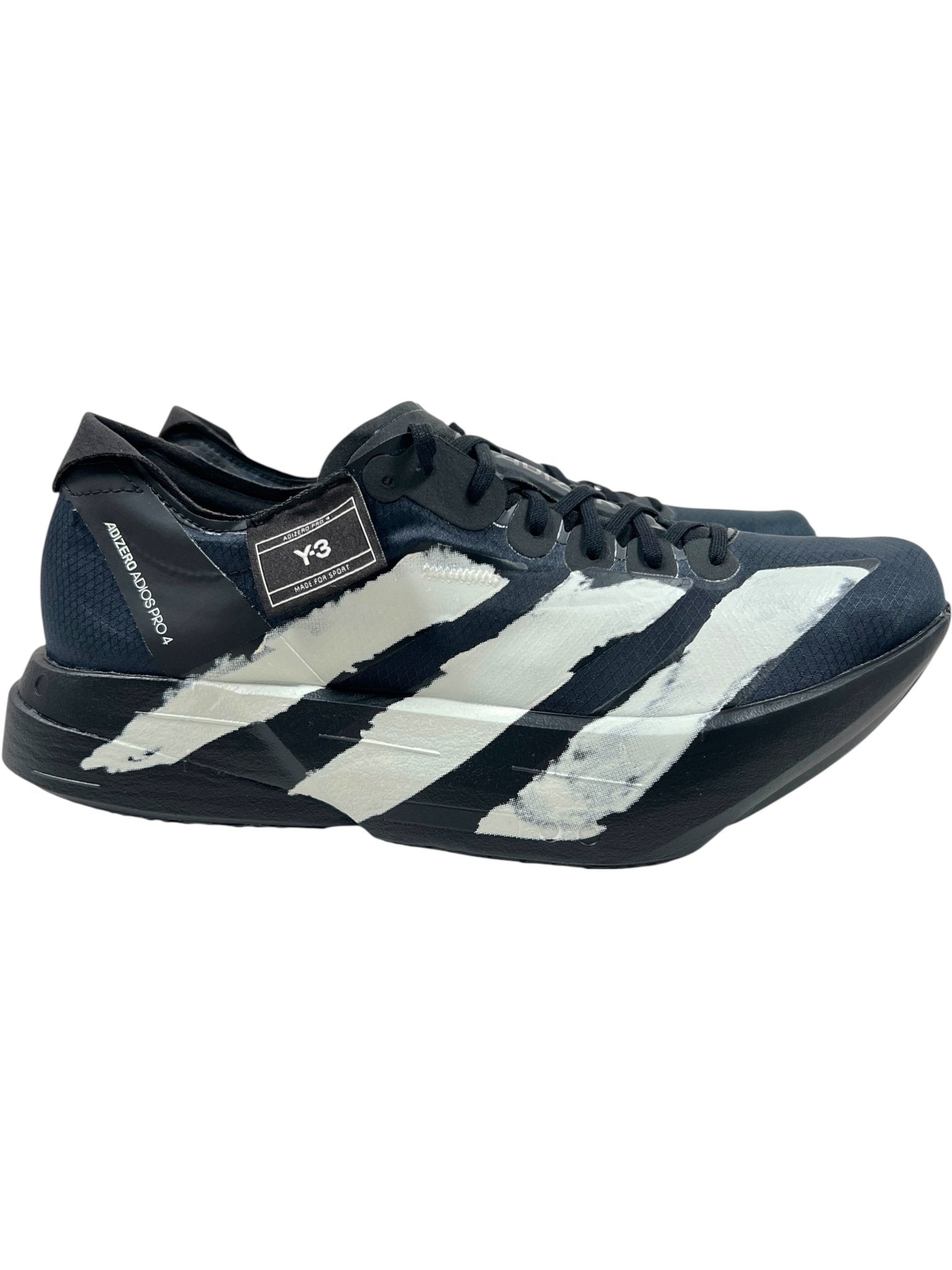 The ADIDAS x Y-3 JR6655 ADIOS PRO 4 M in Black/Black-CWhite features white painterly stripes, Y-3 side branding, visible stitching, and Lightstrike Pro cushioning inspired by the iconic Y-3 Adios Pro 4 running shoes.