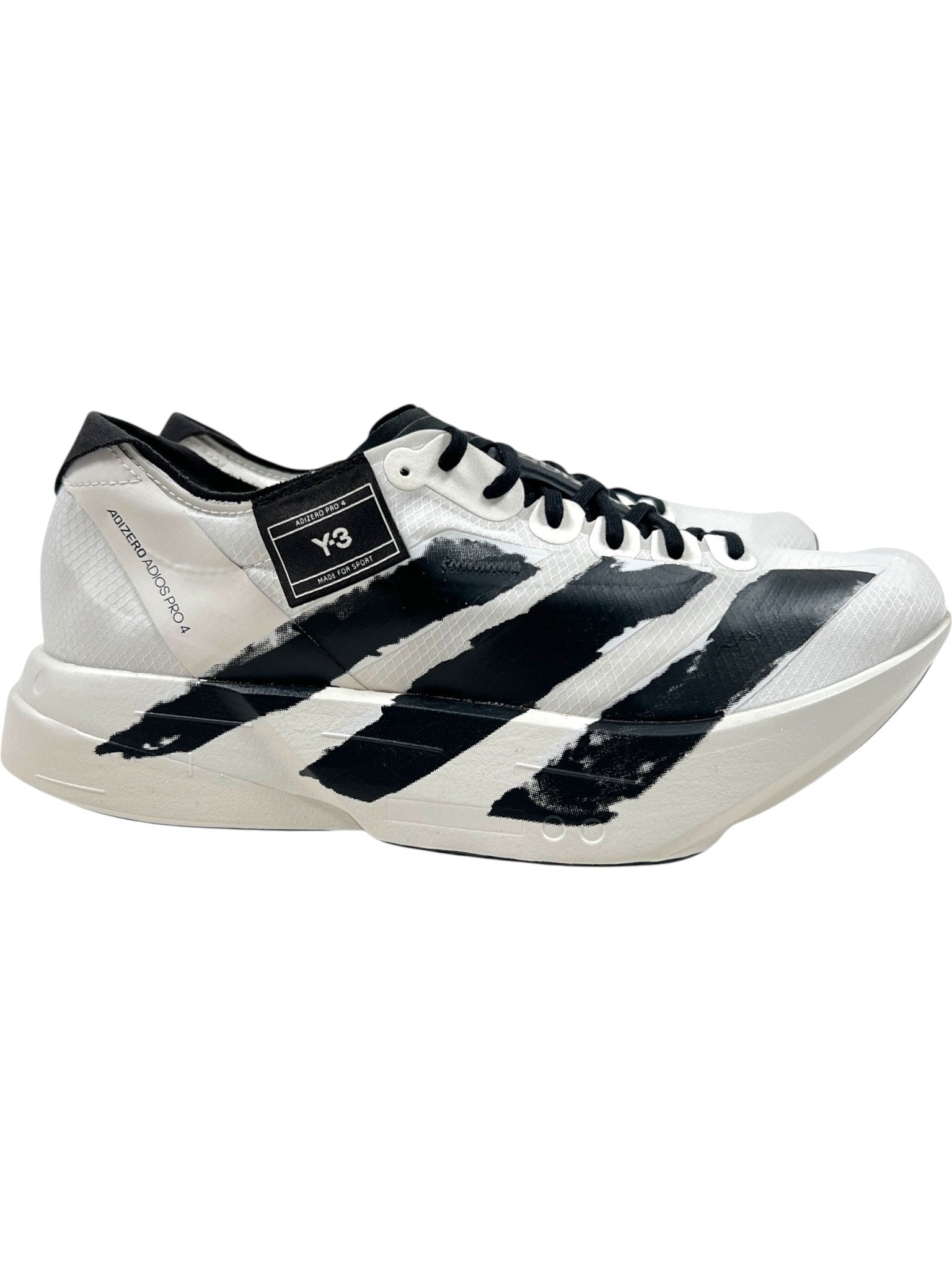 The ADIDAS x Y-3 JR6656 Y-3 Adios Pro 4 M in Orbgry/Black is a white running shoe with bold black stripes, black laces, a "Y-3" side tag, and Lightstrike Pro cushioning for advanced comfort and performance.