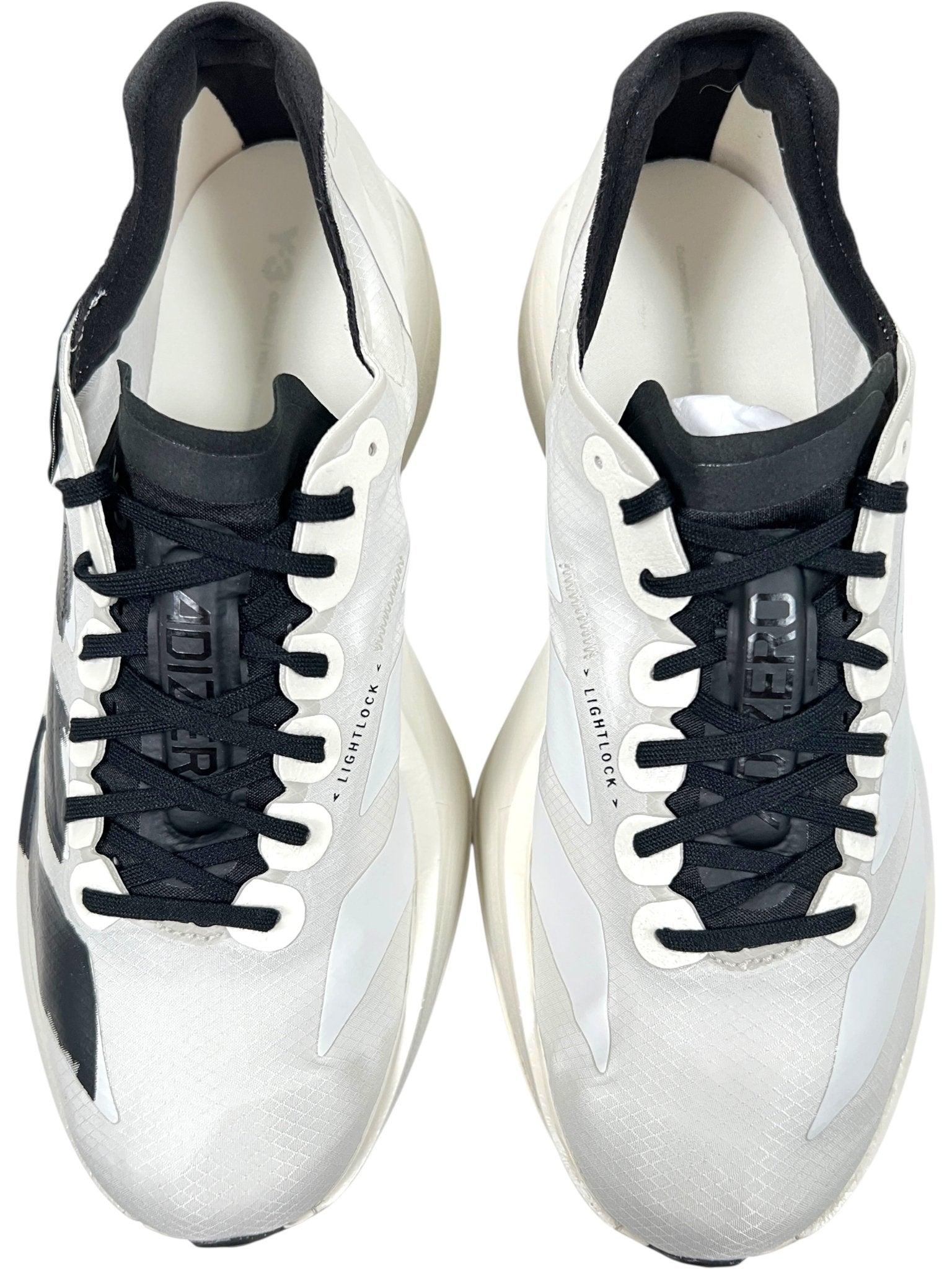 The ADIDAS x Y-3 JR6656 Y-3 Adios Pro 4 M Orbgry/Black running shoes feature thick soles, black laces, “Lightstrike” branding, and advanced Lightstrike Pro cushioning for superior comfort.