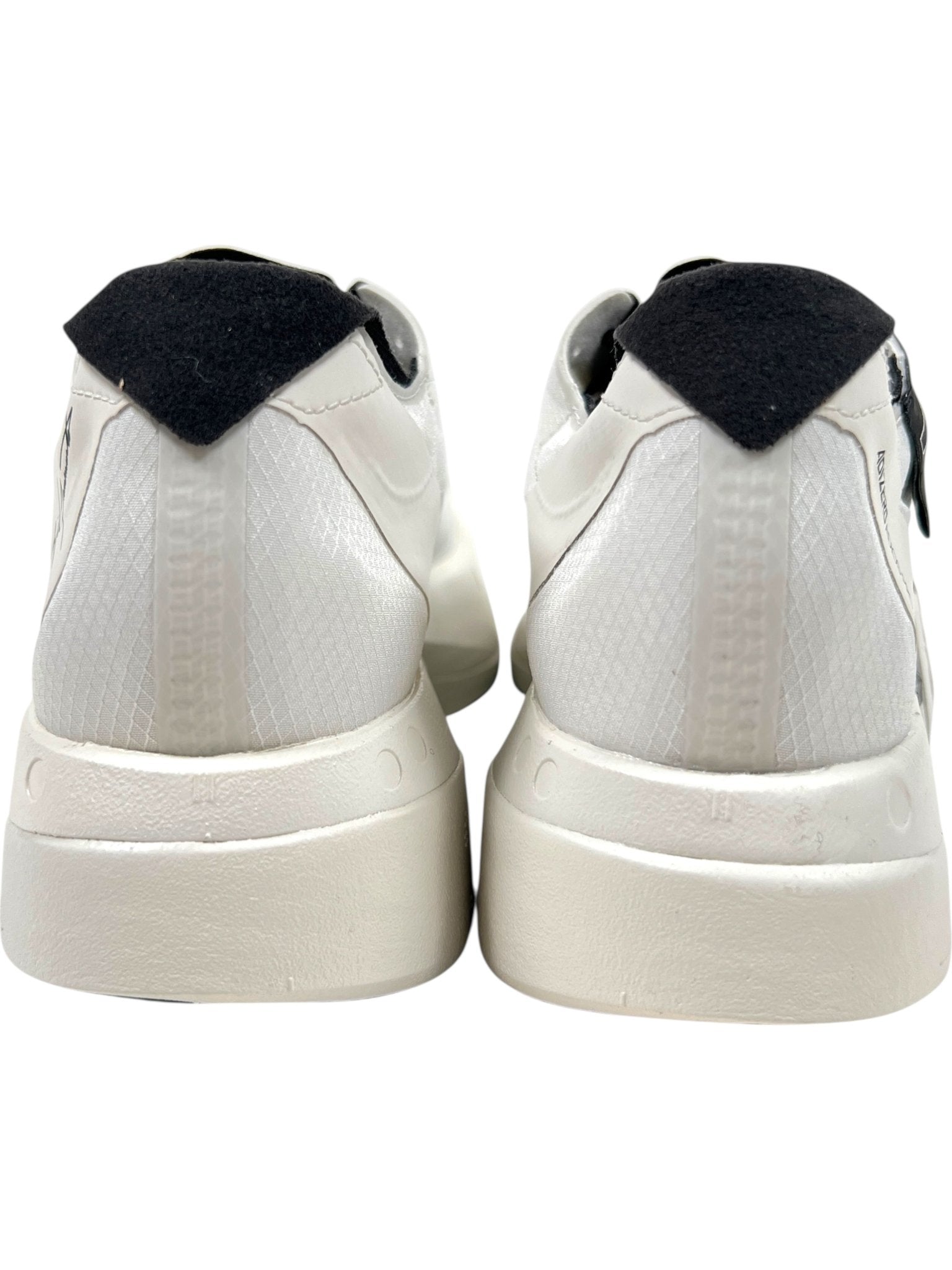 Rear view of the ADIDAS x Y-3 JR6656 Y-3 Adios Pro 4 M in Orbgry/Black, featuring white textured detailing and black heel accents, side by side on a white background, highlighting innovative Lightstrike Pro cushioning for comfort.