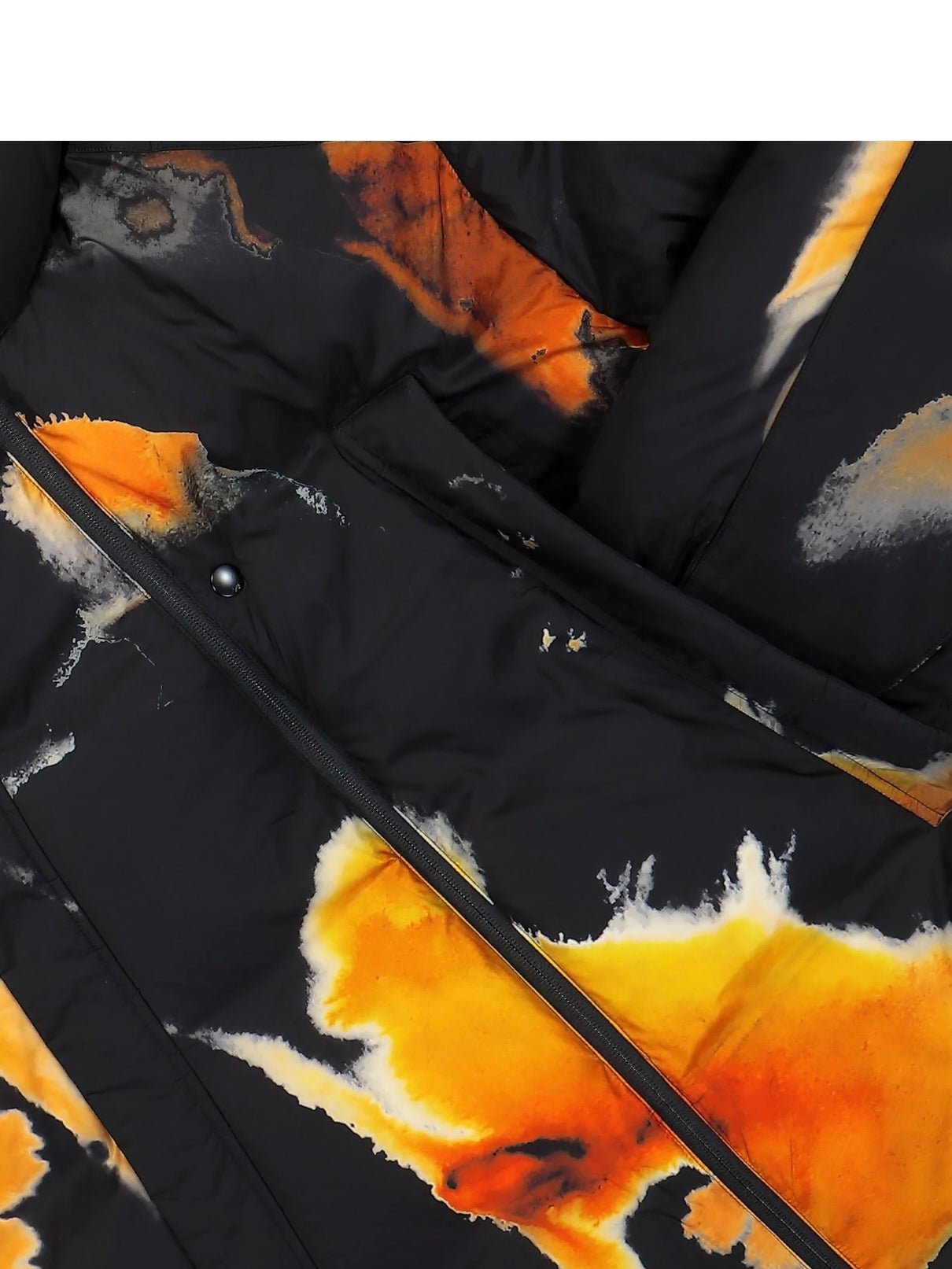 Close-up of the ADIDAS x Y-3 KA2364 M AOP Puff JKT in Multco/Black, featuring a black polyamide base with an abstract orange, yellow, and white tie-dye pattern and a visible zipper.