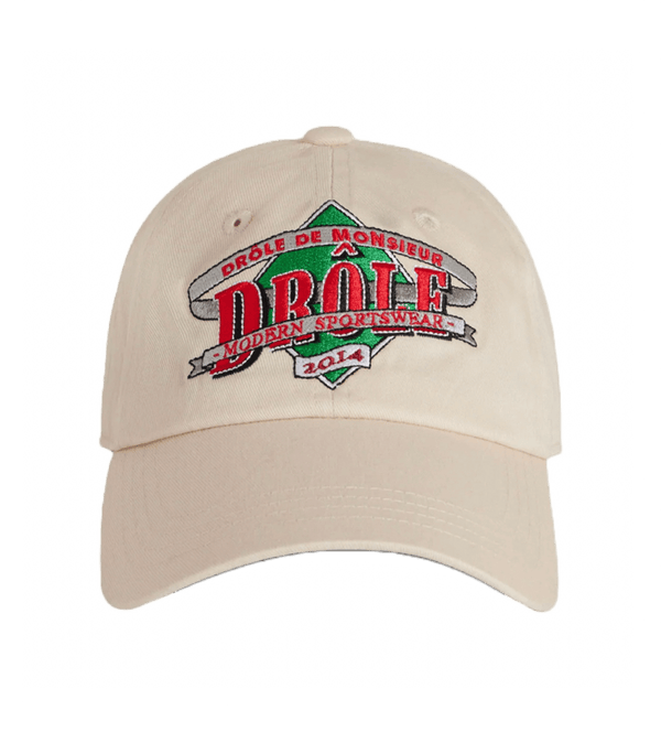 A DROLE DE MONSIEUR hat with the word "drool" embroidered on it.