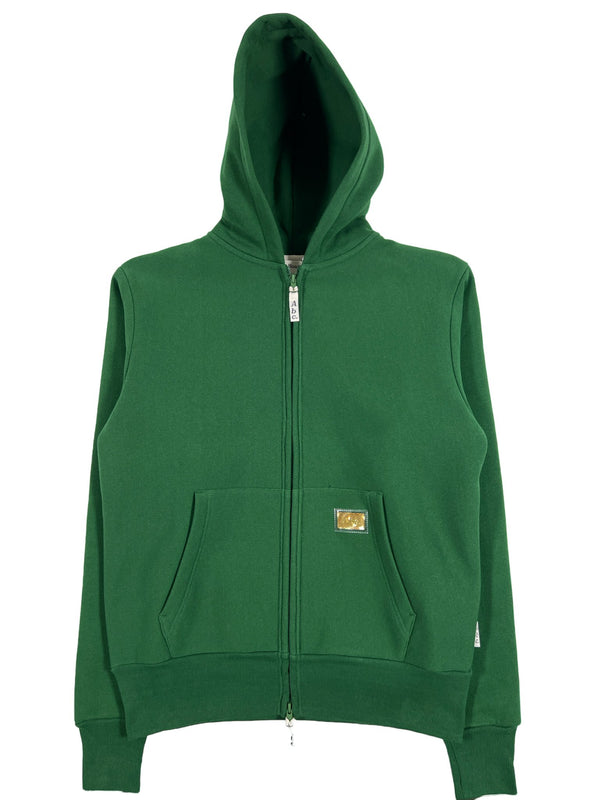 A green ADVISORY BOARD CRYSTALS waffle zip-up hoodie with a Los Angeles logo on it.