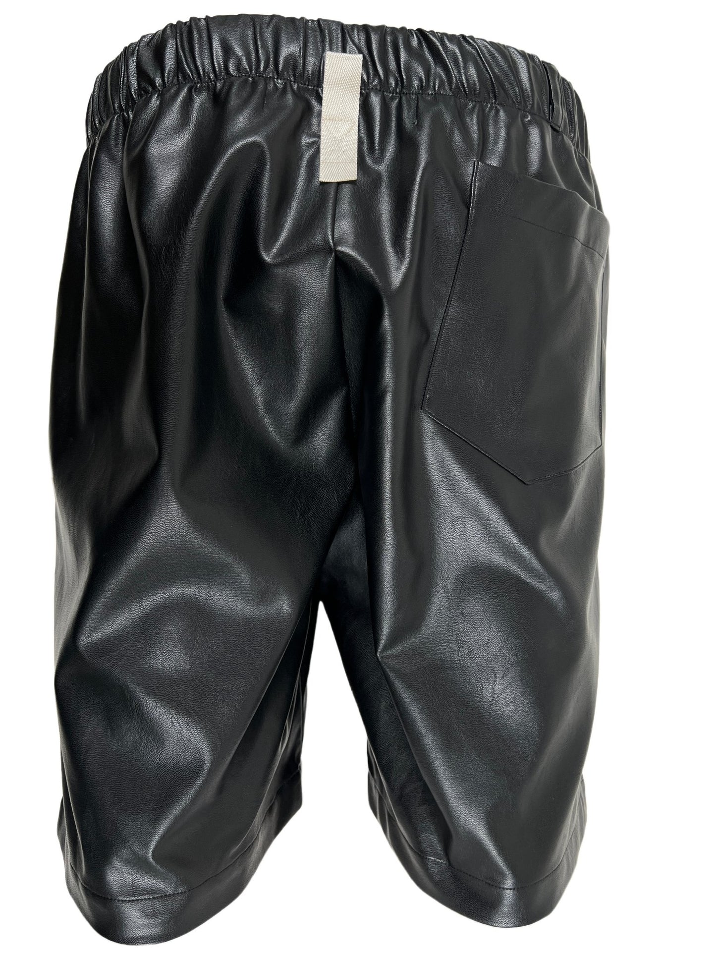 A black ADVISORY BOARD CRYSTALS polyester basketball shorts on a white background.