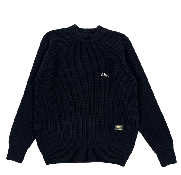 A ADVISORY BOARD CRYSTALS RIBBED CREWNECK ANTHRACITE BLACK sweater featuring an embroidered white logo on it and crafted from 100% Cotton French Terry fabric.