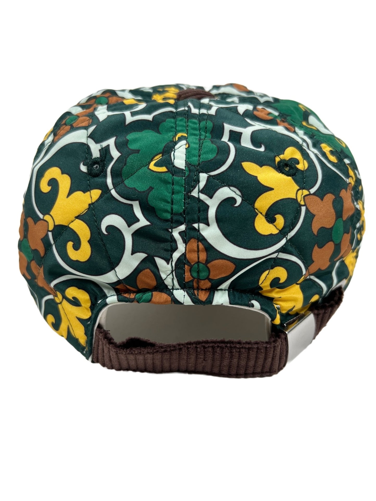 A DROLE DE MONSIEUR hat with a floral pattern, featuring a buckle closing system.