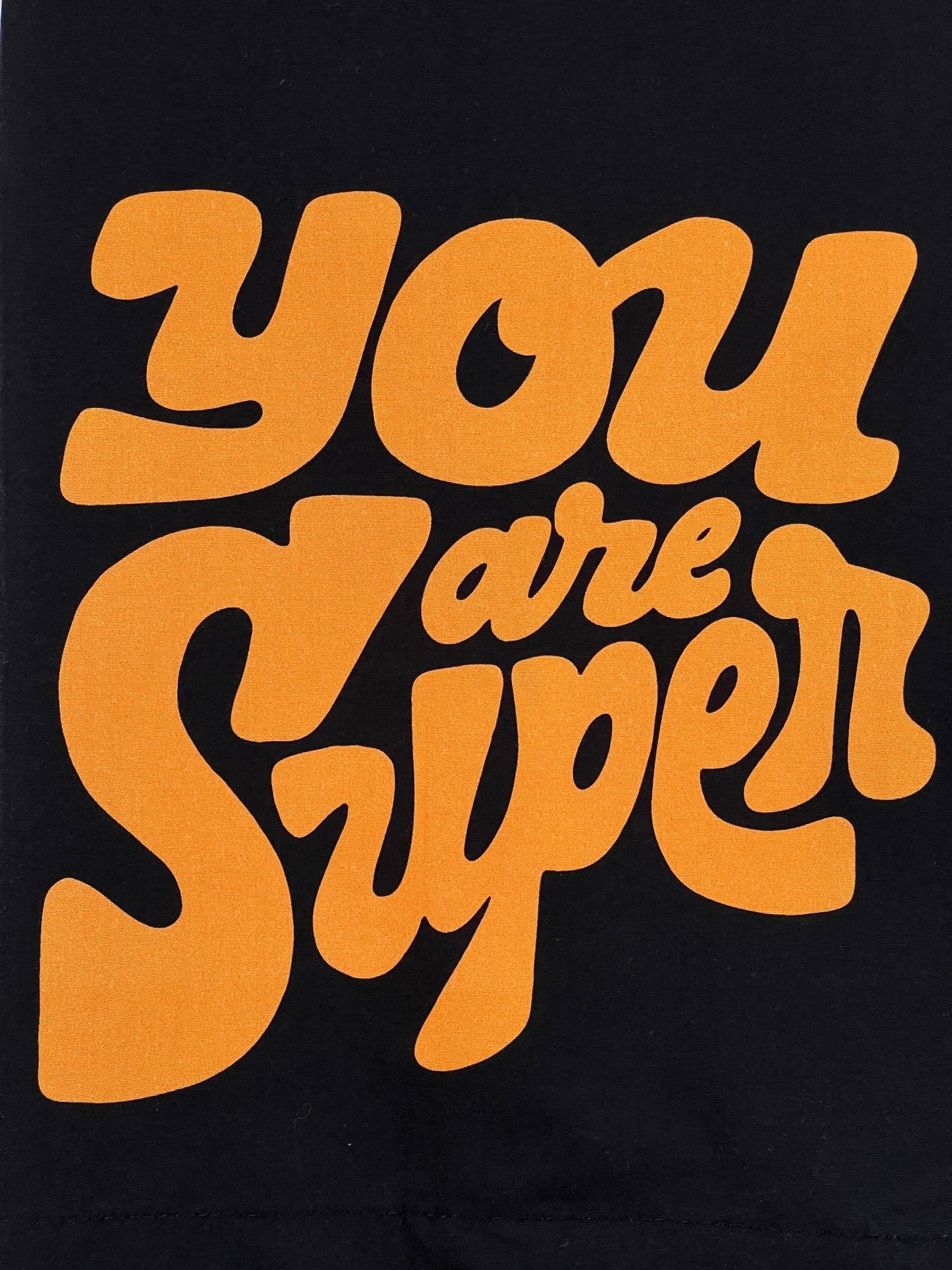 Bold orange text stating 'you are super' on a BARROW S4BWUASI059 POPELINE SHIRT UNISEX with a black poplin background featuring a multicolor print.