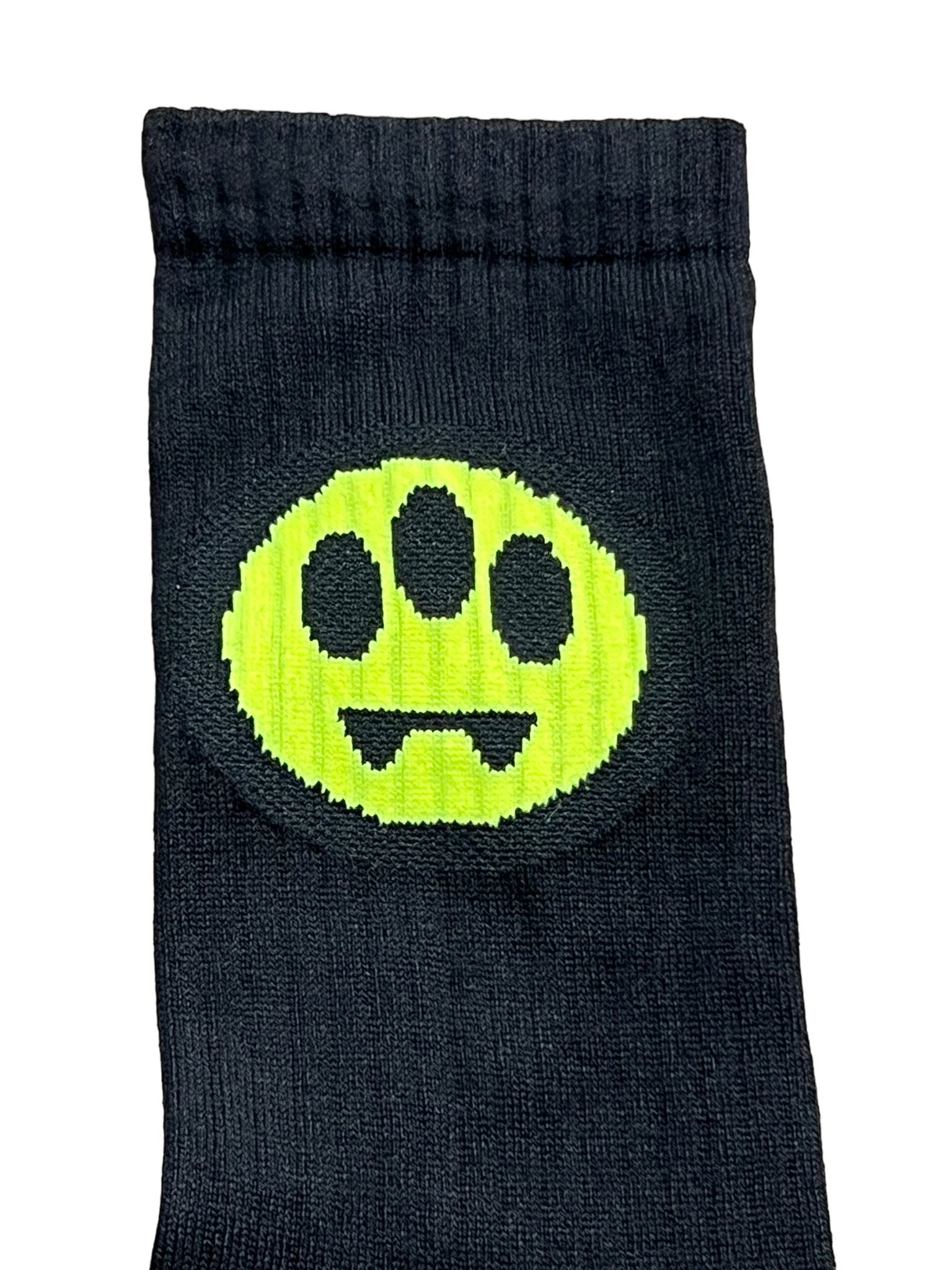 The Barrow S4BWUASO140 Socks Unisex, by BARROW, feature a playful pattern with a yellow smiley face, black eyes, and a zigzag mouth set against a sophisticated black background and are crafted in Italy.