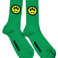 The Barrow S4BWUASO140 Socks Unisex feature a lively green design with a playful yellow smiley face sporting fangs. The word "BARROW" is prominently printed in black on the sole of each sock. Made in Italy, these vibrant socks by BARROW add a distinctive touch to any ensemble.
