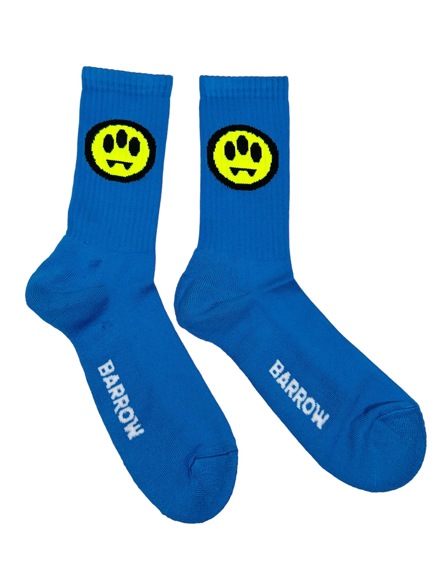 These lively green Barrow S4BWUASO140 socks from BARROW showcase a whimsical neon yellow smiley face, and "BARROW" is tastefully inscribed on the soles in white. Expertly crafted in Italy, they offer both style and quality for an entertaining take on a traditional accessory.