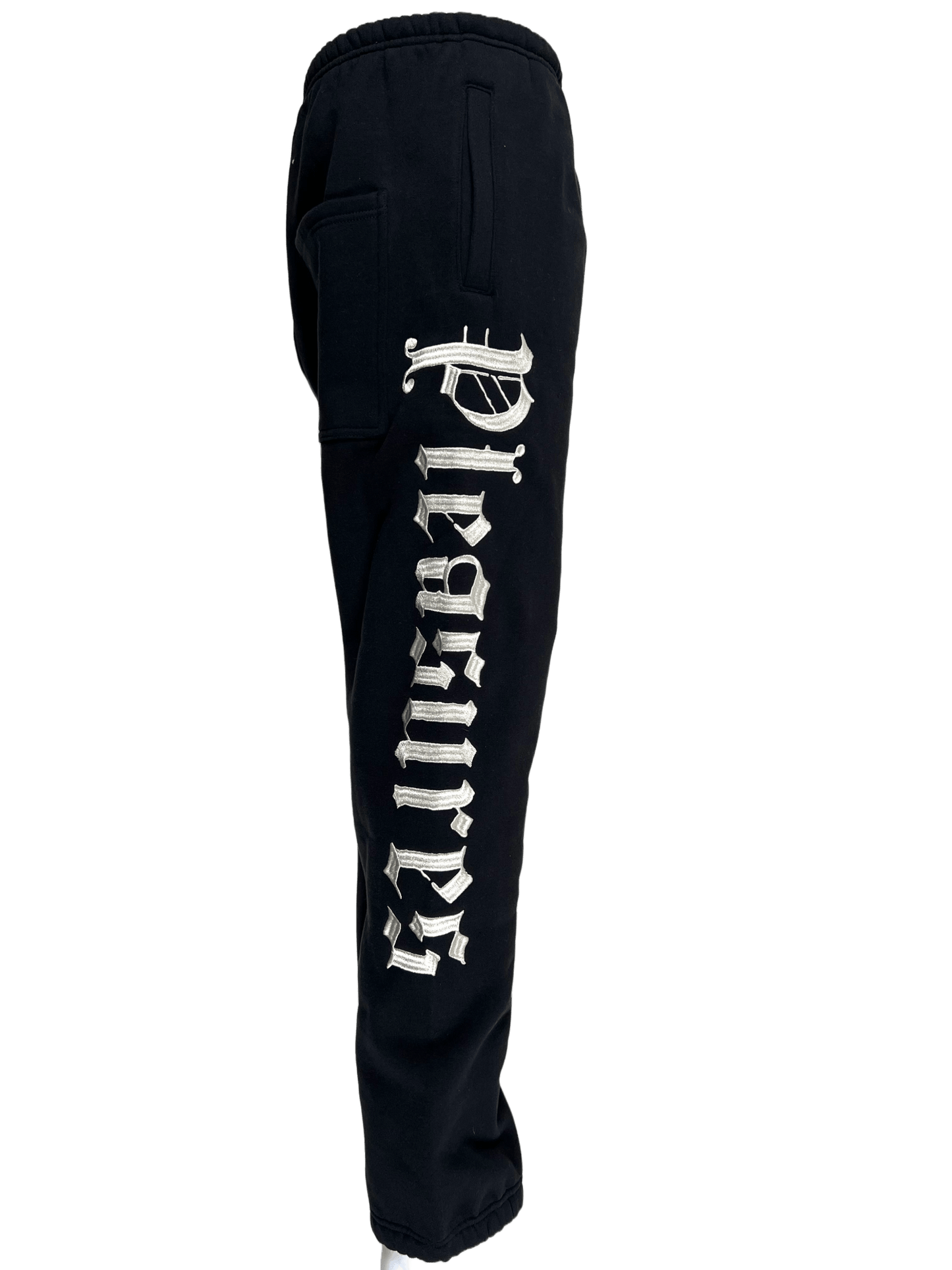 A black cotton fleece sweatpants with a white logo print on it can be replaced with "PLEASURES BURNOUT SWEATPANTS BLACK by PLEASURES".