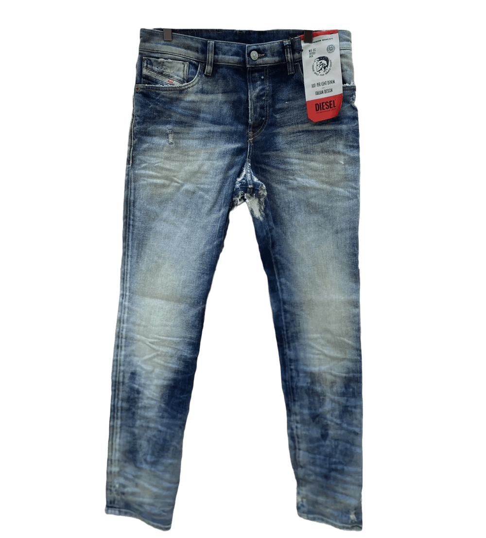 A pair of DIESEL D-KRAS-X-SP4 09VI DENIM jeans with a tag on them.
