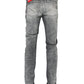 Back view of Diesel 1979 Sleenker 9H74 skinny jeans in gray, made from stretch denim with red tags, featuring pockets and belt loops.