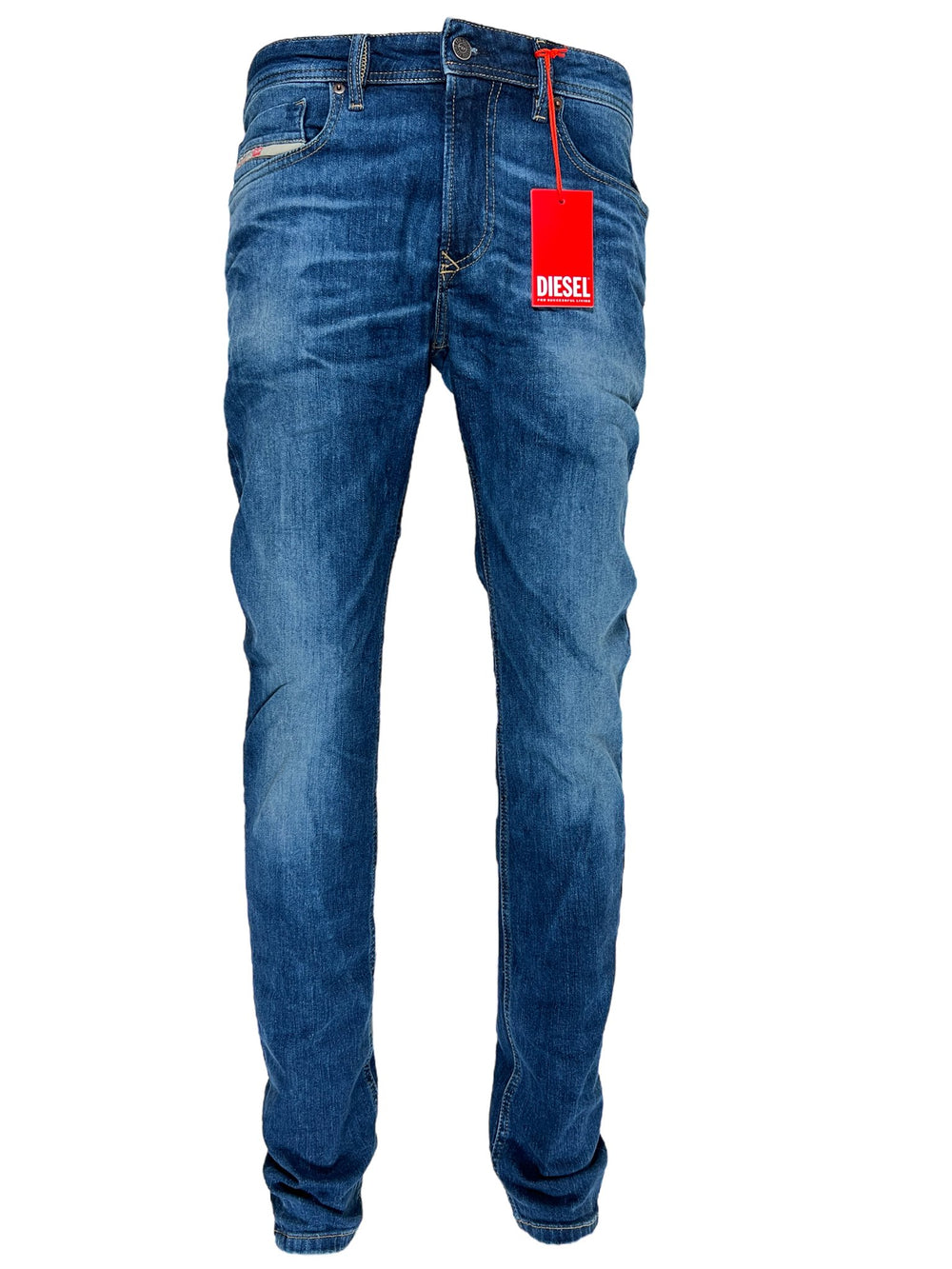 A pair of DIESEL 1979 SLEENKER PFAU DENIM jeans with a red tag on them.