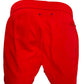 Men's DIESEL BMBX-MARIO-34 SHORT RED swimming shorts with an elastic waistband and a back pocket isolated on a white background.