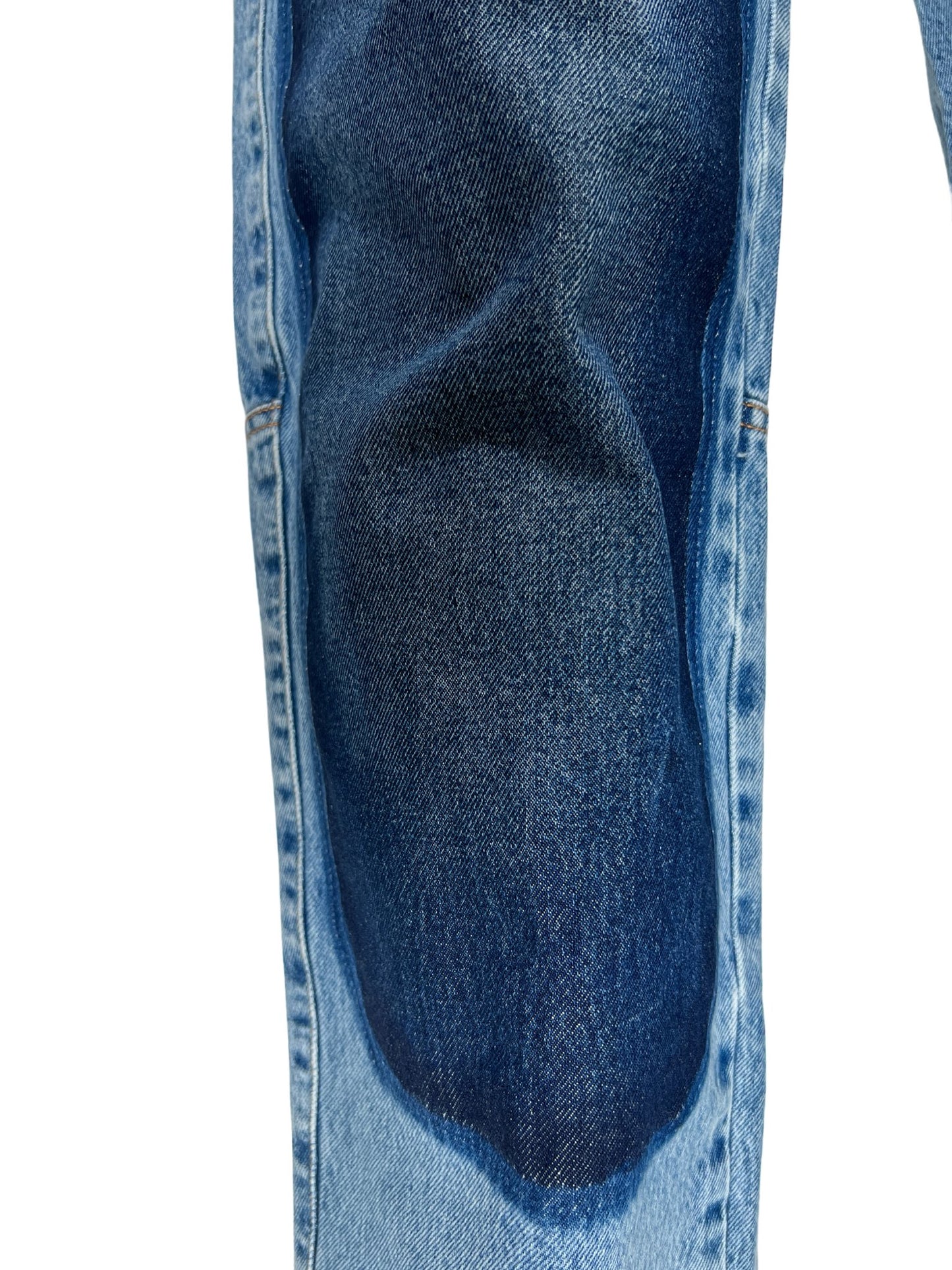 Close-up of a section of DIESEL D-P-5-D-S JEANS GHAW denim fabric with a visible seam.