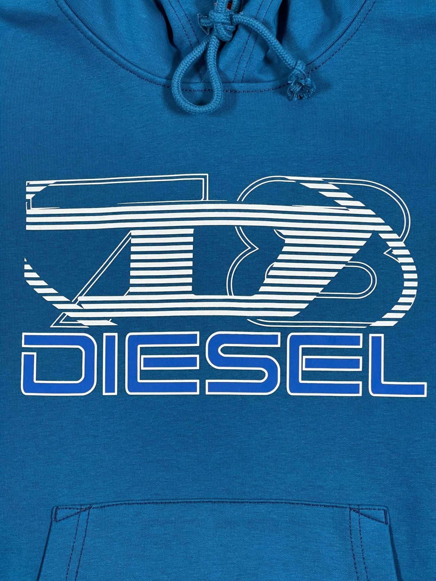 A blue cotton hoodie with the word DIESEL on it.

Product Name: DIESEL S-GINN-HOOD-K40 TEAL
Brand Name: DIESEL