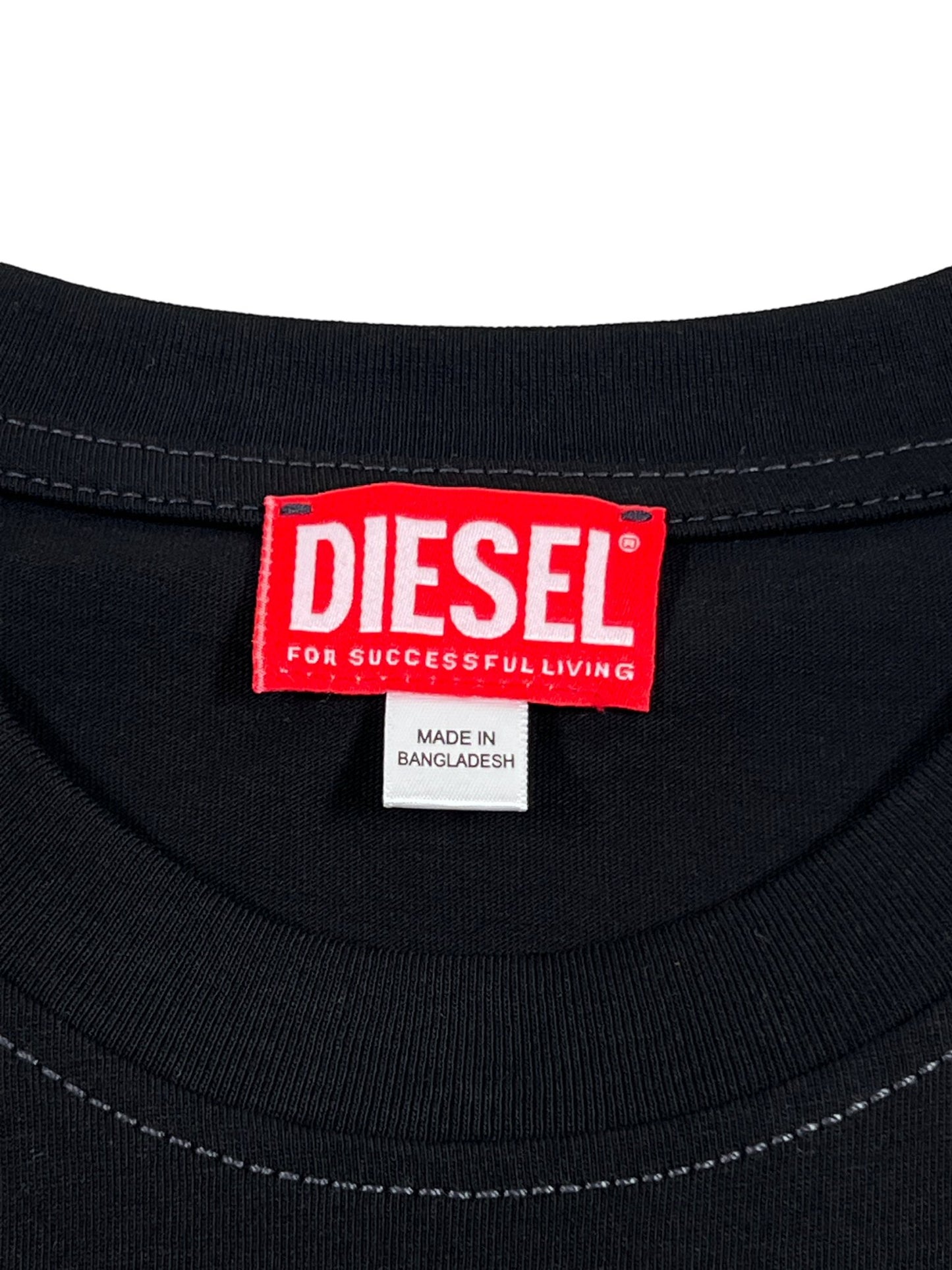 Close-up of a DIESEL logo on a DIESEL T-BOXT-N12 T-SHIRT BLACK tee with the text "for successful living" and "made in Bangladesh".