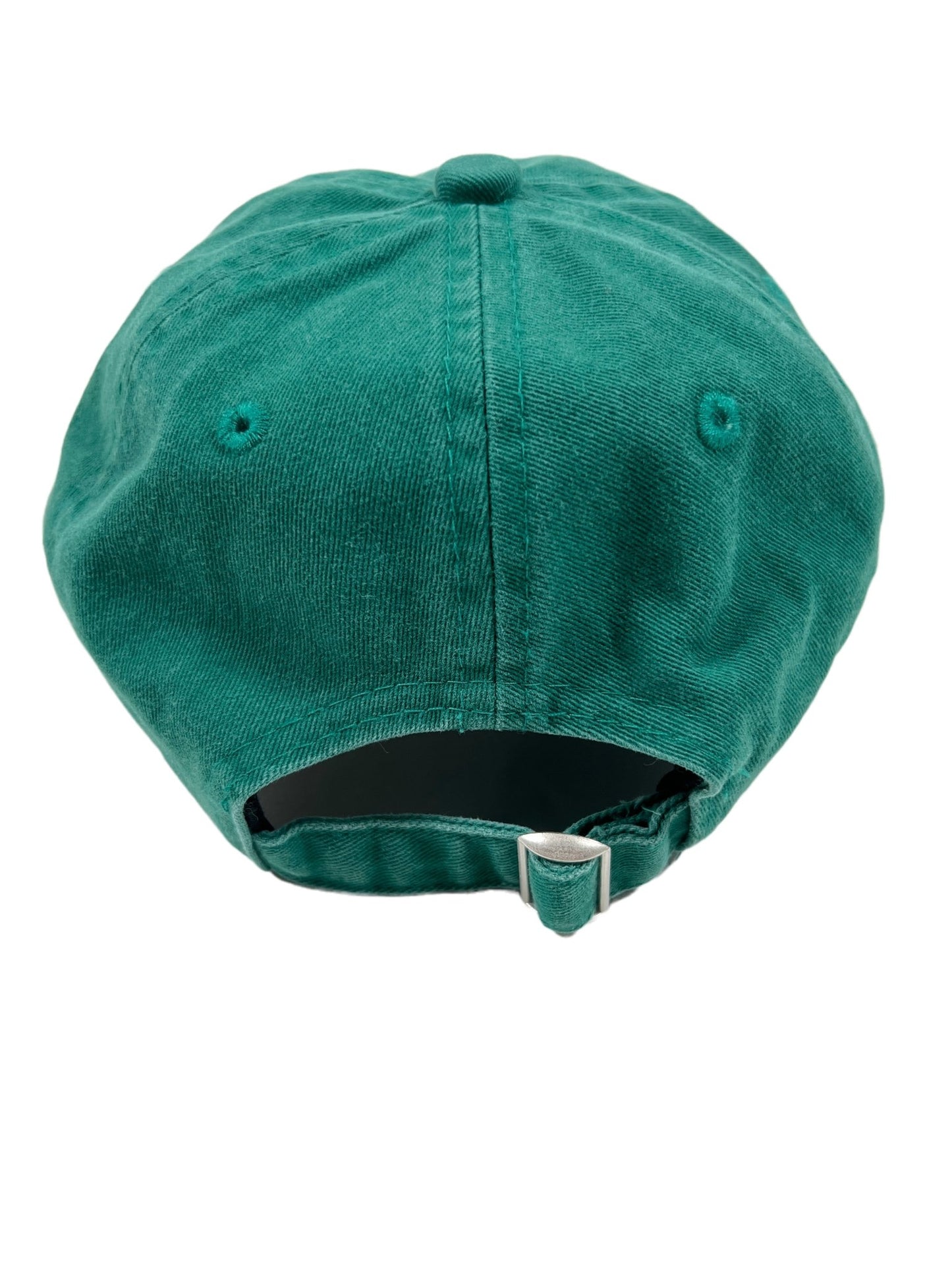 A green DROLE DE MONSIEUR baseball cap with an adjustable strap and embroidered branding.