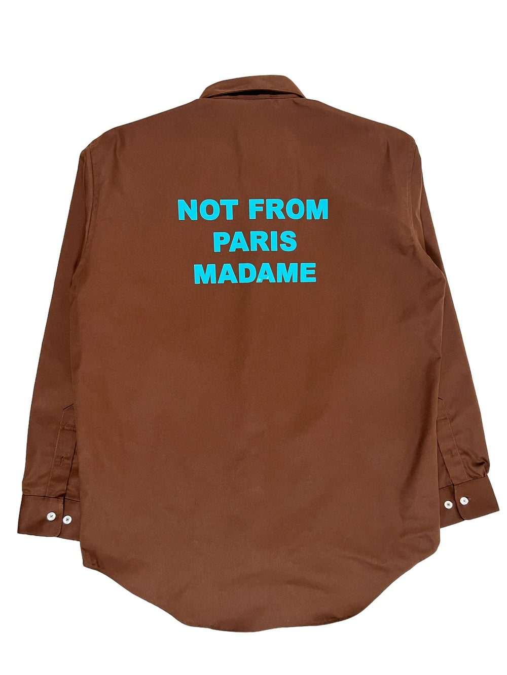 A DROLE DE MONSIEUR button down shirt that says not from paris madame.