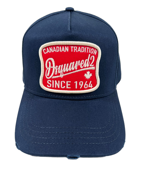 A DSQUARED2 navy blue hat with the words Canadian tradition embroidered on it.