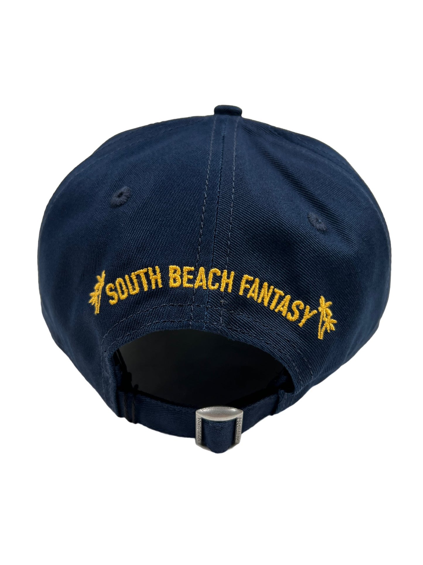 A DSQUARED2 navy blue baseball cap with the words "South Beach Fantasy" on it, perfect for any fashion enthusiast.