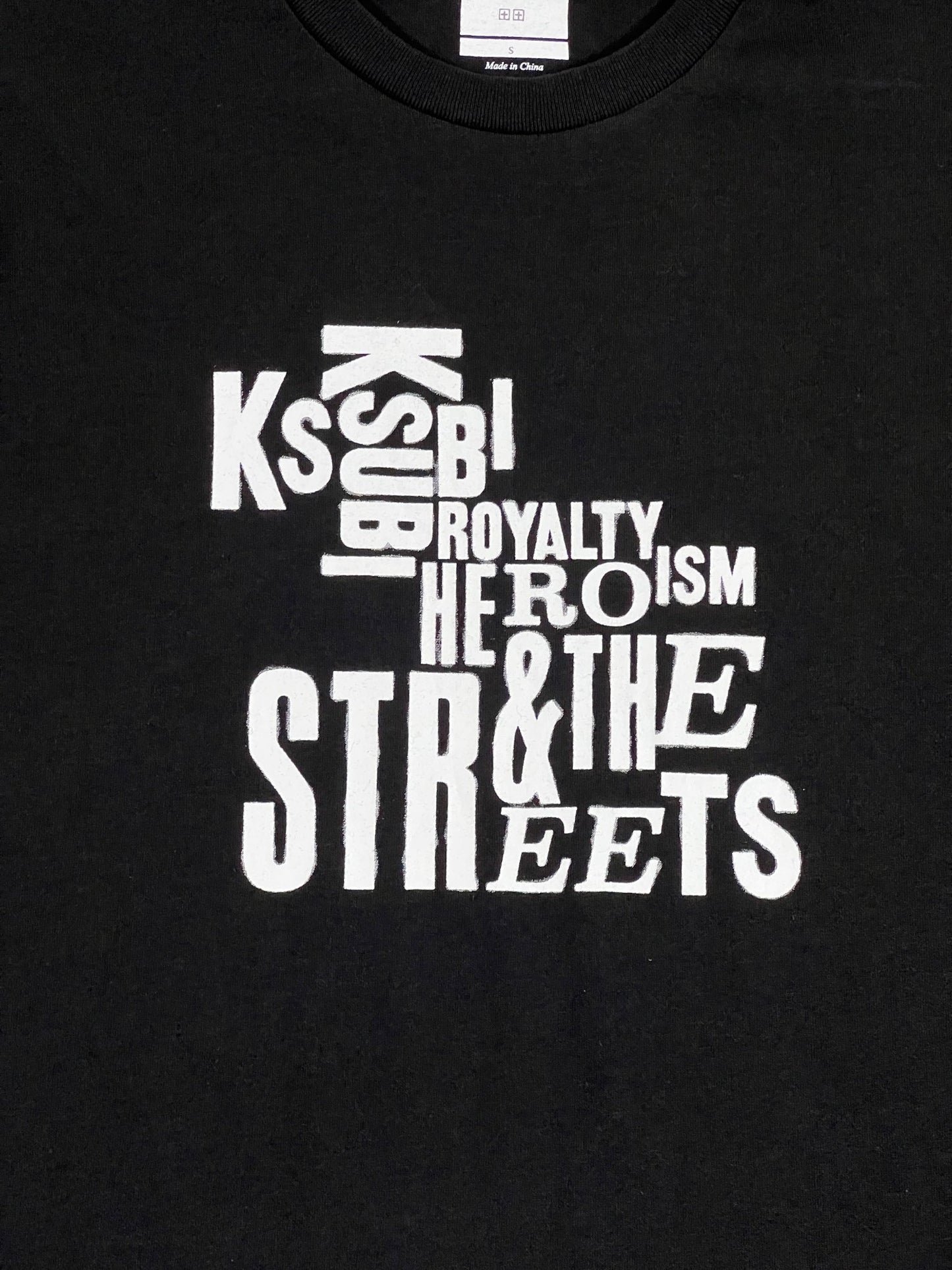 A black cotton jersey t-shirt with the words "ksbb ksbb ksbb ksb" in Ksubi artwork - KSUBI GRAFF KASH SS TEE JET BLACK.