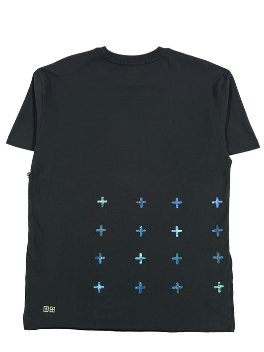 KSUBI SPACE PALM BIGGIE SS TEE JET BLACK from KSUBI, featuring 100% cotton fabric, adorned with a pattern of small, multi-colored plus signs on the lower half and a discreet logo in the bottom left corner.