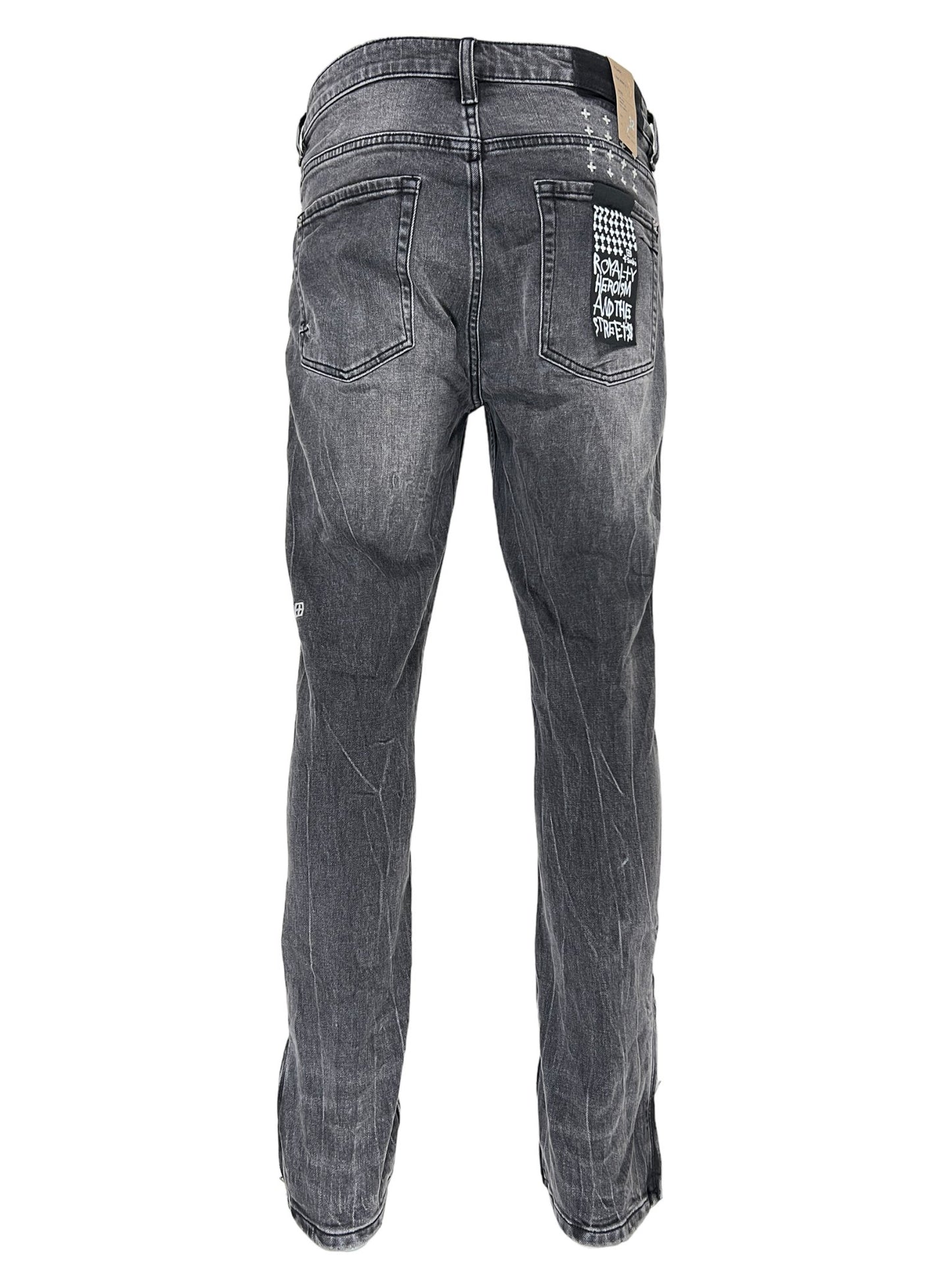 The back view of a pair of KSUBI VAN WINKLE CHAMBER BLACK skinny jeans.