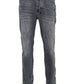 A pair of KSUBI VAN WINKLE CHAMBER BLACK men's skinny jeans on a white background.